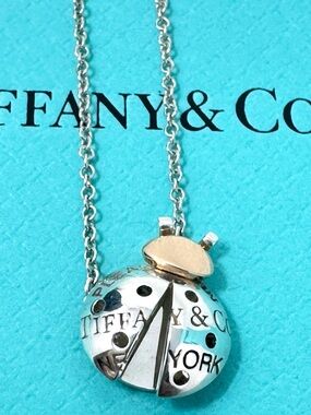 Authentic Tiffany & co. Silver / 18k AG 925/ AU 750 Rose Gold Lady Bug Necklace.